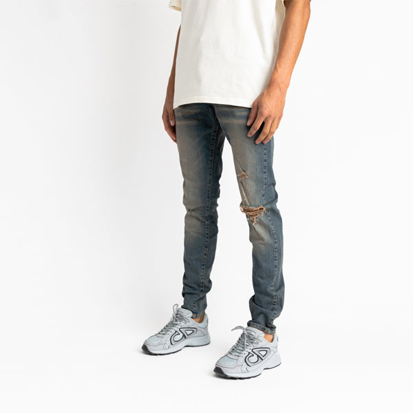 Sand Washed Jeans With Destroyed Knee