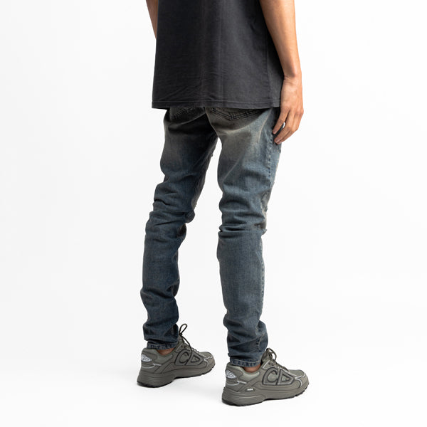 Destroyed Repaired Sand Jeans