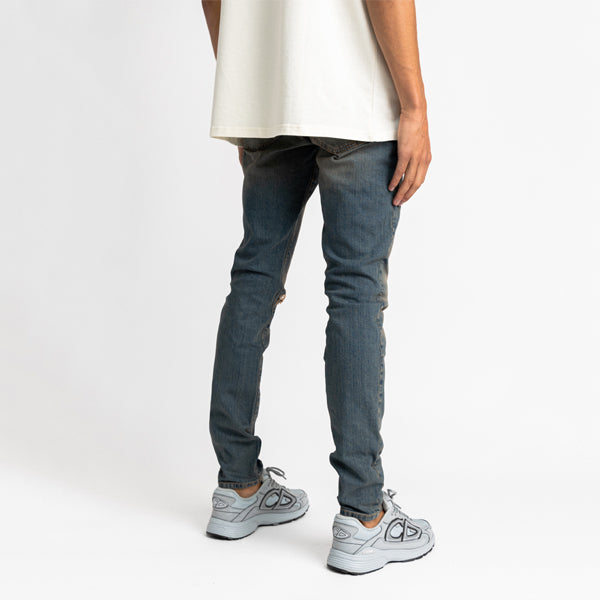 Sand Washed Jeans With Destroyed Knee