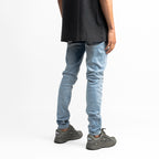 Destroyed Repaired Light Blue Jeans